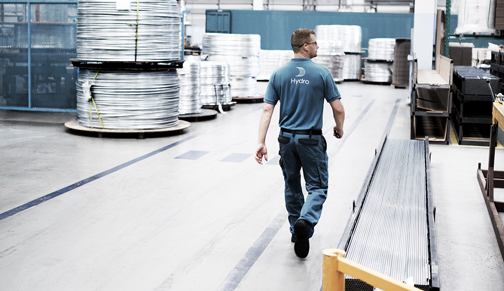 worker at aluminum factory floor