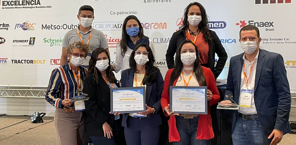 a group of people posing for a photo