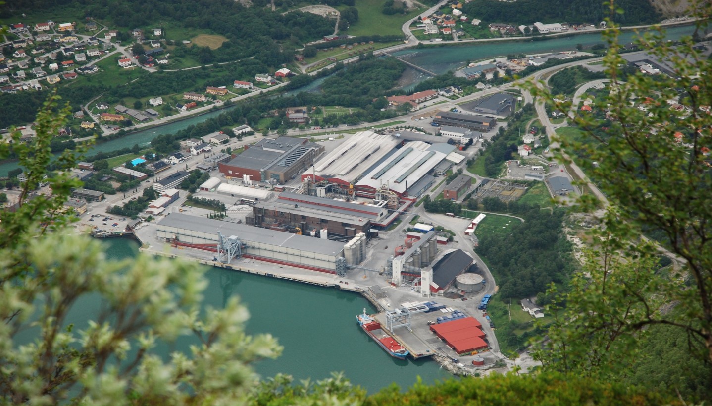 a large building next to a body of water