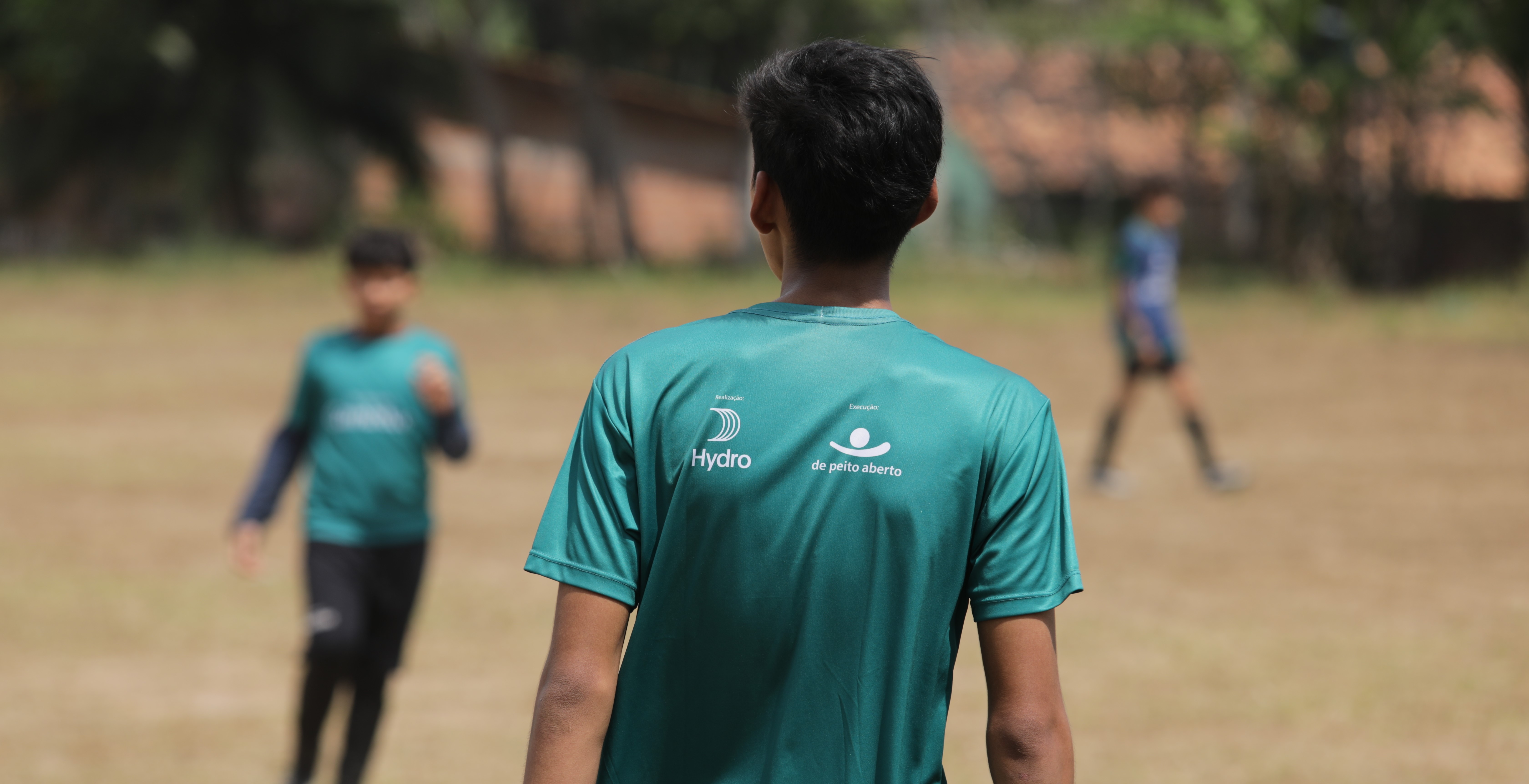 a man in a green shirt