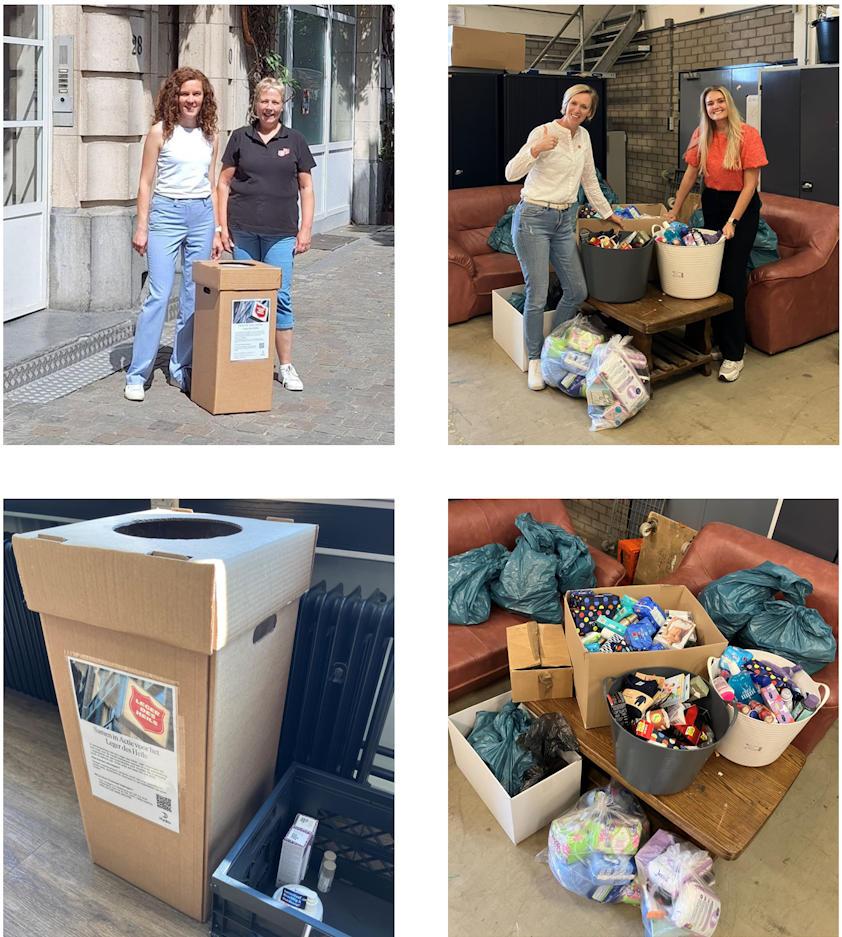 a group of people standing in a room with boxes and furniture