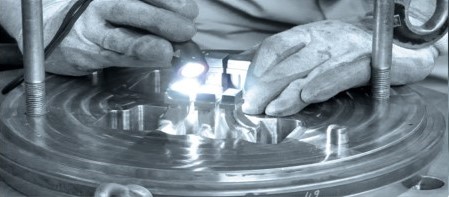 a person working on a machine