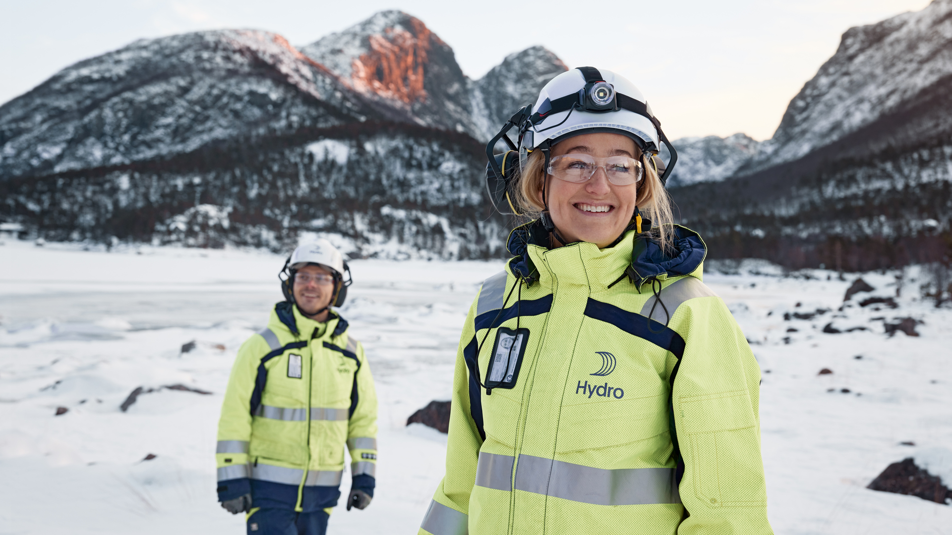 a couple of people in snow gear