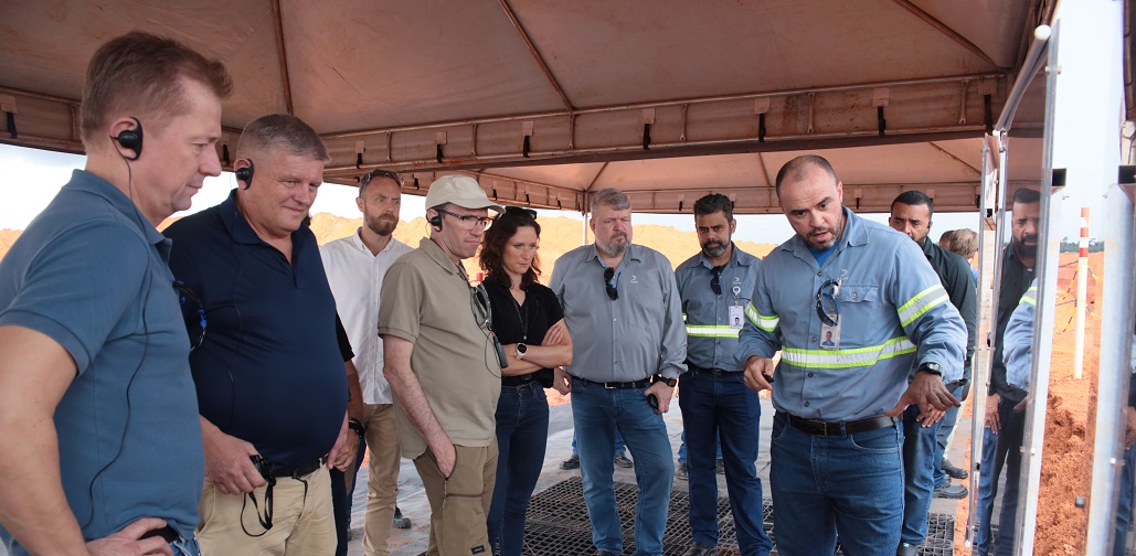 a group of people standing in a room
