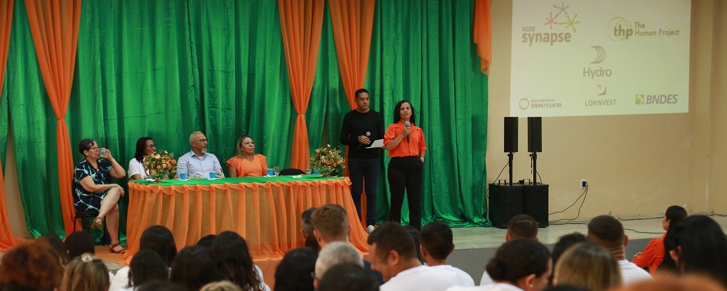 a man and woman on stage